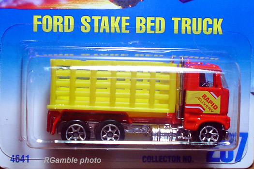 Loose Hot Wheels Blue Ford Stake Bed Truck w/Yellow Box w/Blackwall Wheels 